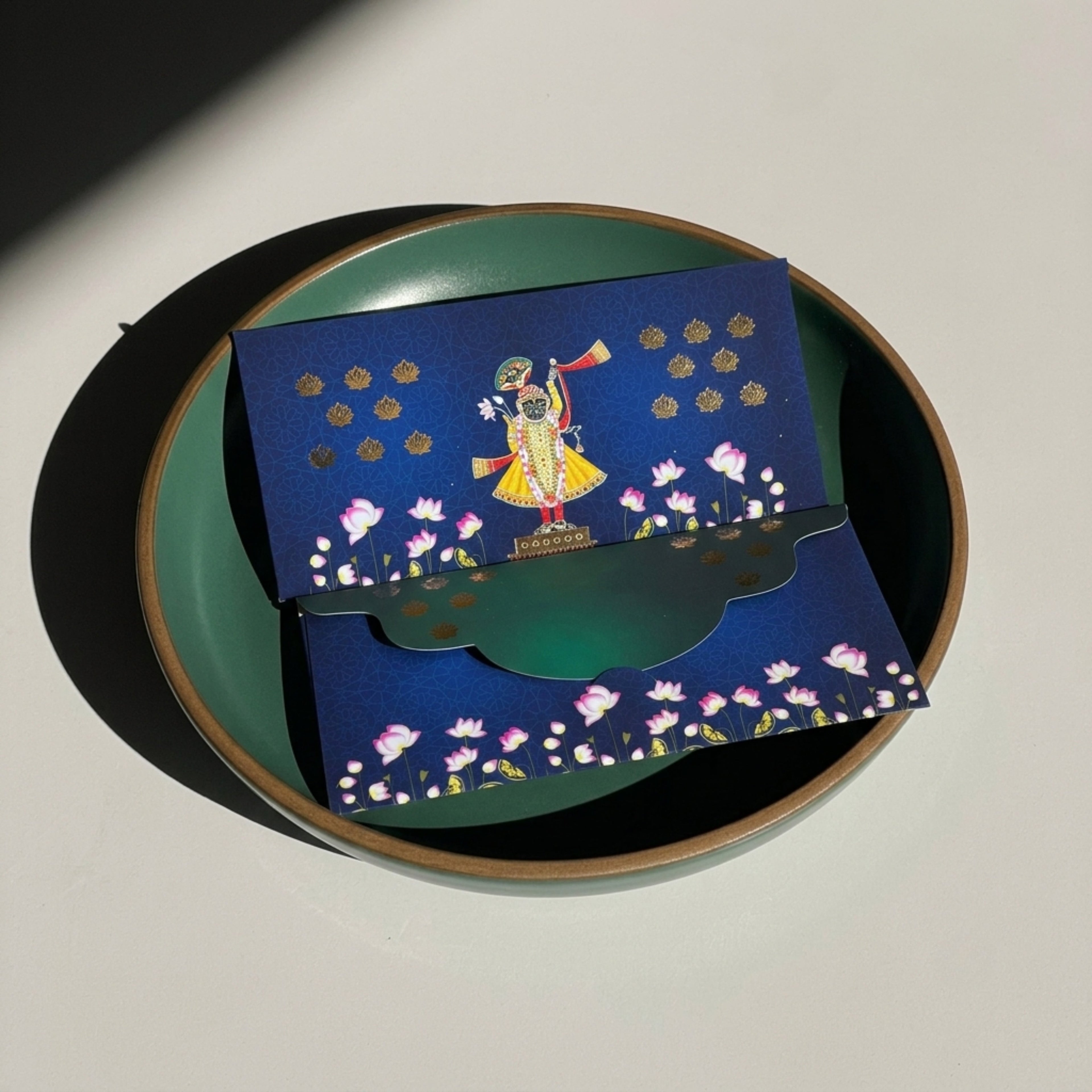 Gold-foiled Shreenath ji shagun money envelope by Mijaurie